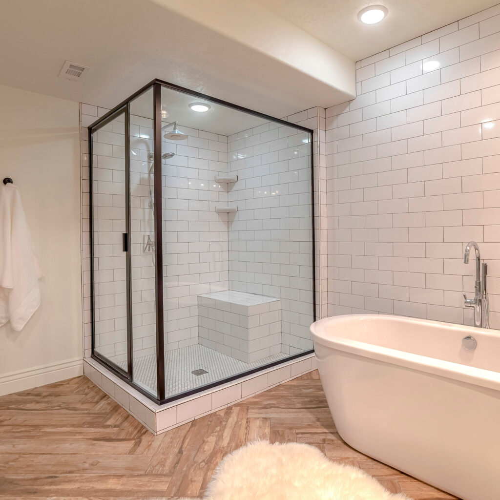 Square frame Contemporary bathroom with free standing bath tub